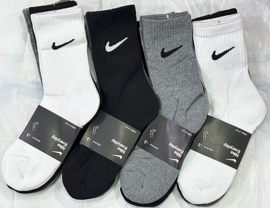 1 docena de calcetas nike larga.